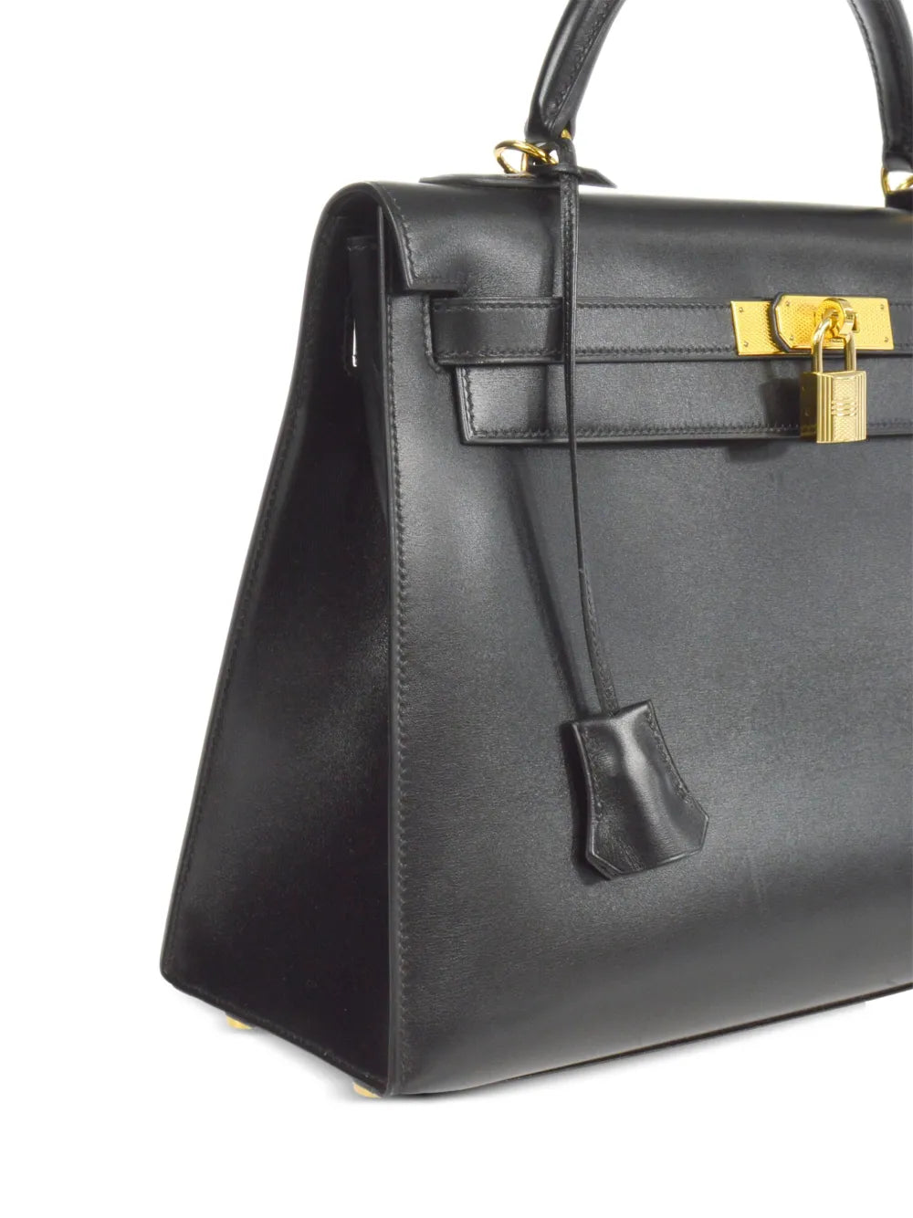 Pre-OwnedHermre-Owned2004 Kelly 32 Sellier two-way handbag