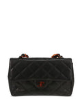 Pre-OwnedCHANEL Pre-Owned1990s medium Classic Flap shoulder bag