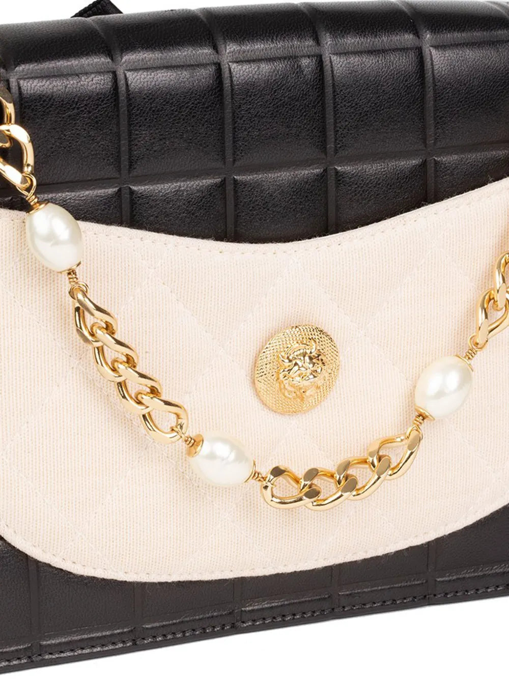 Pre-OwnedCHANEL Pre-Owned1990s Camellia-appliquChoco Bar shoulder bag