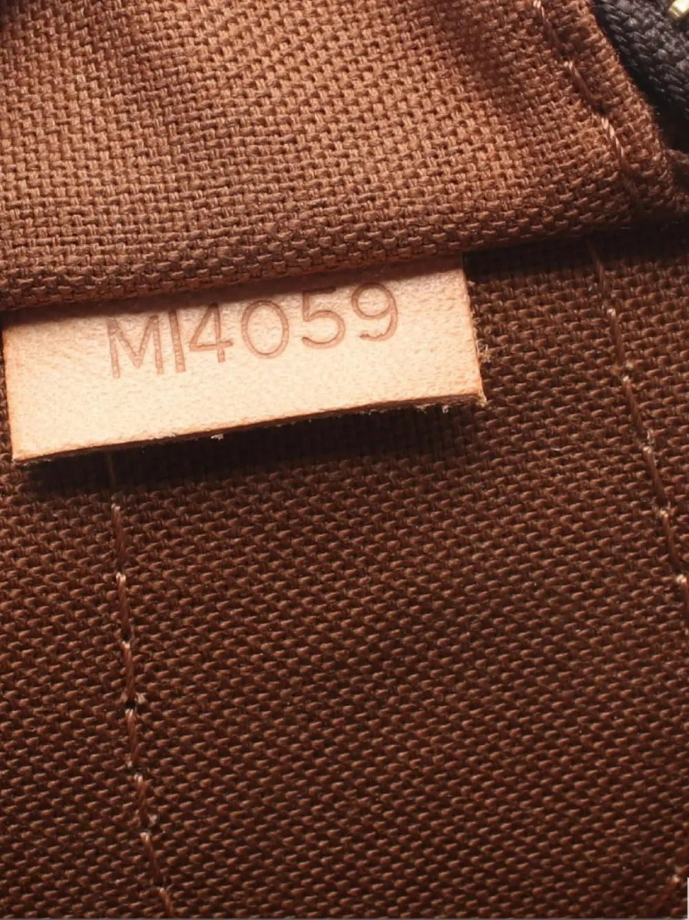 Pre-OwnedLouis Vuitton Pre-Owned2009 Montorgueil PM tote bag