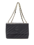 Pre-OwnedCHANEL Pre-Owned1994-1996 Jumbo CC Diagonal Quilted Caviar Flap shoulder bag