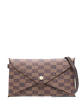 Moreaugeometric-pattern clutch bag