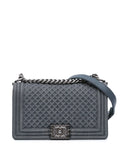 Pre-OwnedCHANEL Pre-Owned2016-2017 Medium Embossed Denim Boy Flap crossbody bag