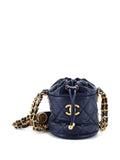 Pre-OwnedCHANEL Pre-OwnedTwist Your Buttons Drawstring Quilted Caviar Mini bucket bag
